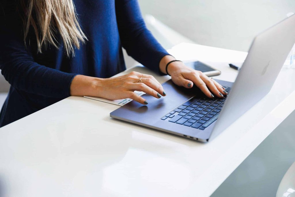 a woman working on her laptop